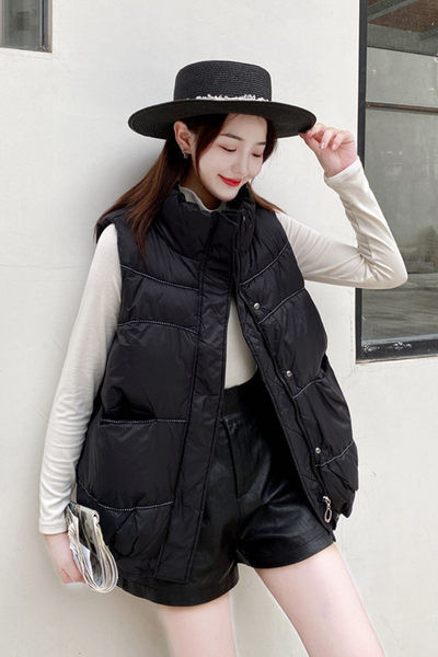 Lai nööpide ja lukuga naiste vesti mudel