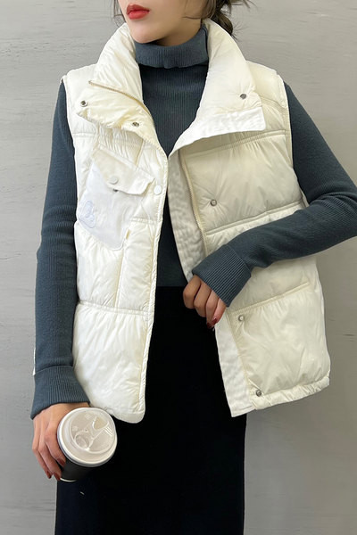 Kevad-sügis naiste vest asümmeetrilise kinnitusega