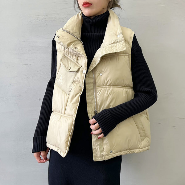 Kevad-sügis naiste vest asümmeetrilise kinnitusega