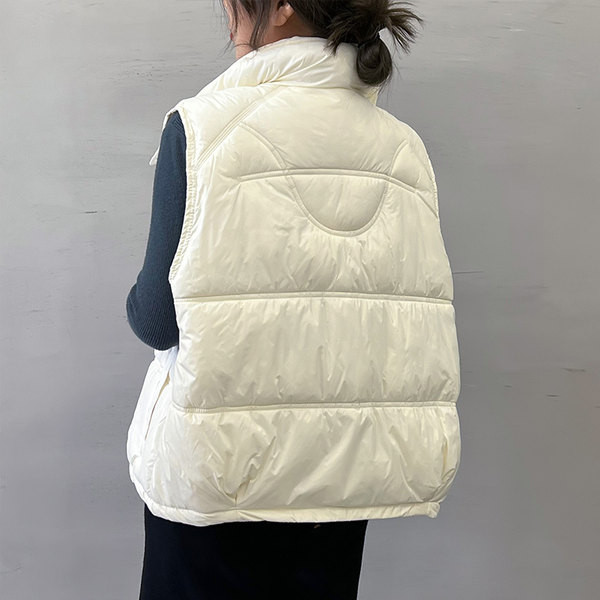 Kevad-sügis naiste vest asümmeetrilise kinnitusega