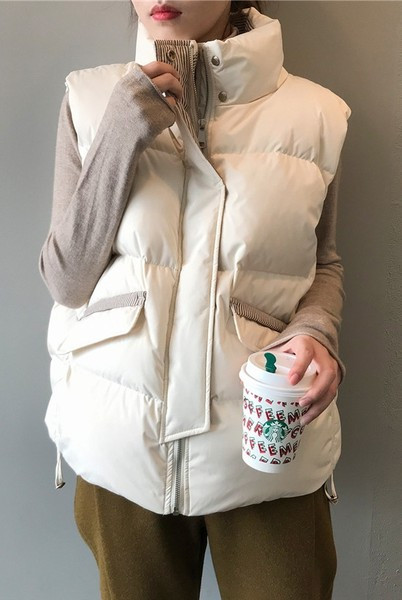 Lai mudel nööpidega naiste vestist