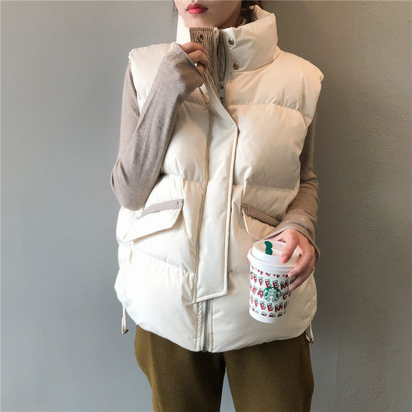 Lai mudel nööpidega naiste vestist