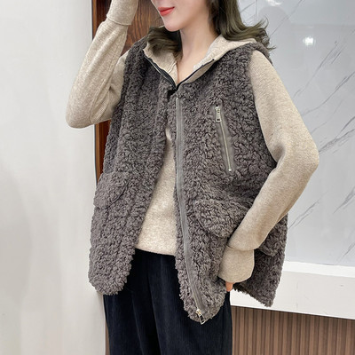 Modern női pehelymellény zsebekkel és spitz nyakkivágással