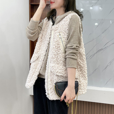 Modern női pehelymellény zsebekkel és spitz nyakkivágással