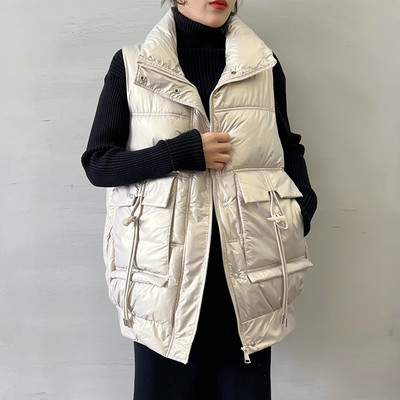 Naiste vesti lai taskute ja lipsudega mudel