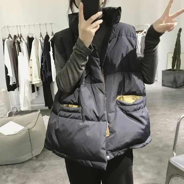 Széles modell téli mellény zsebekkel