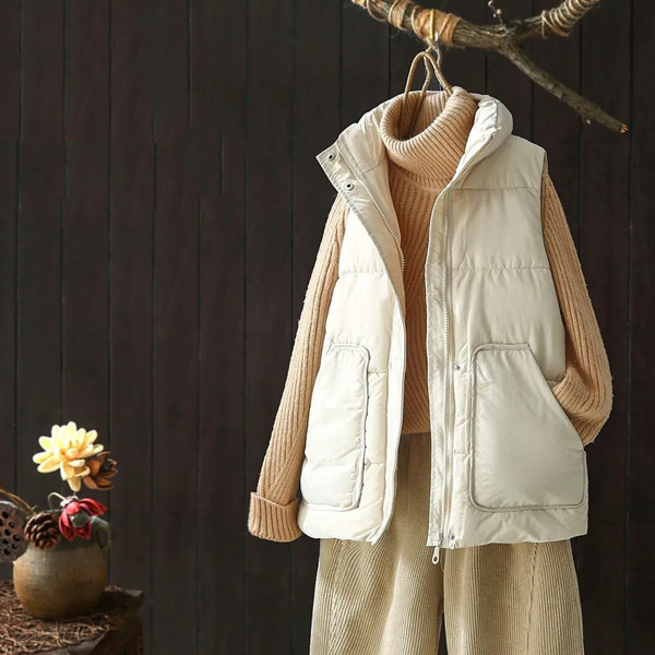 Széles női mellény zsebekkel és cipzárral két színben