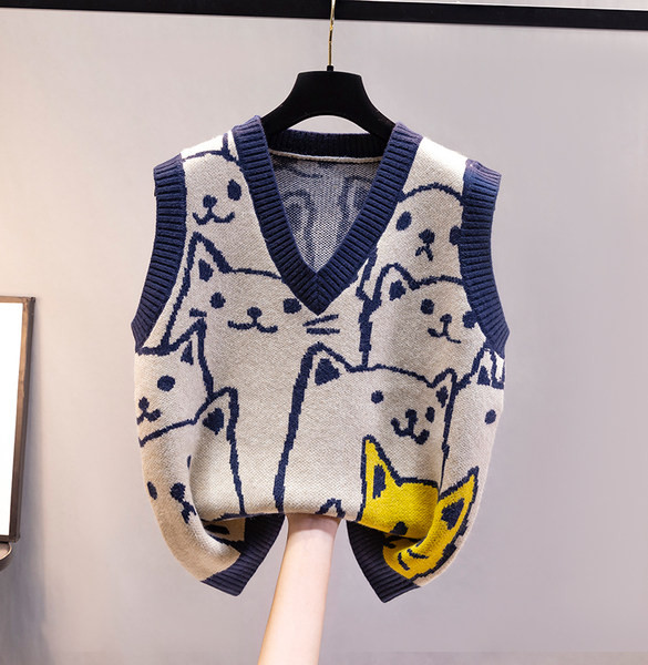 Ženski prsluk s aplikacijom i špic izrezom