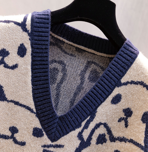 Ženski prsluk s aplikacijom i špic izrezom