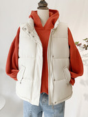 Stiilne naiste pikk vest lukuga nööpide ja taskutega