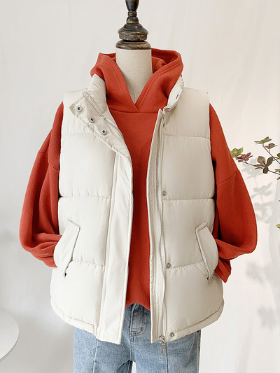 Stiilne naiste pikk vest lukuga nööpide ja taskutega