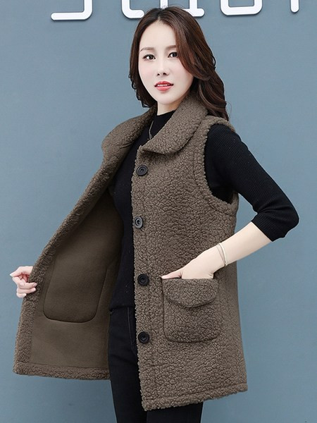 Alkalmi női pehelymellény gombokkal és zsebekkel