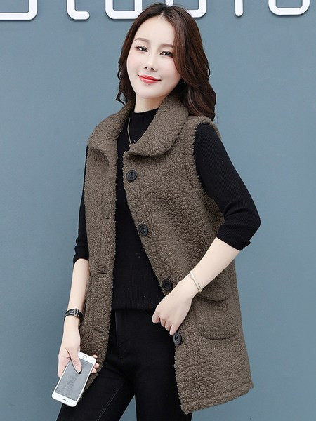 Alkalmi női pehelymellény gombokkal és zsebekkel