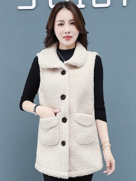 Alkalmi női pehelymellény gombokkal és zsebekkel