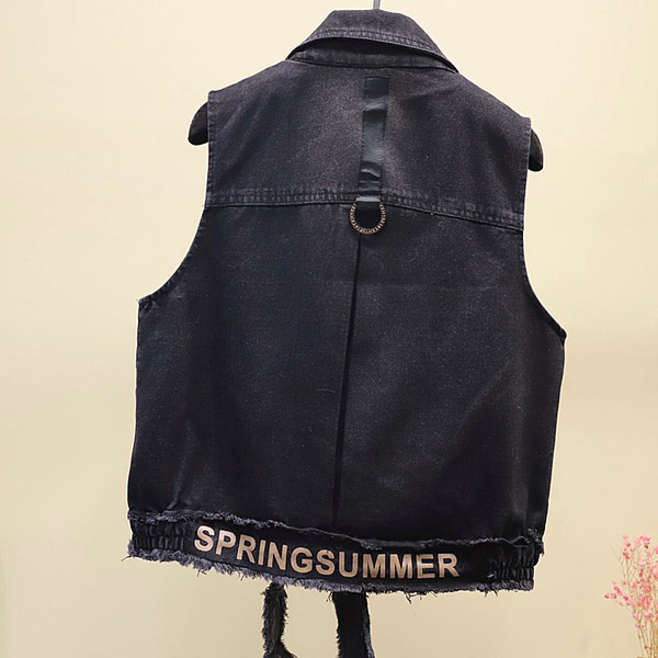 Γυναικείο φαρδύ τζιν γιλέκο με κουμπιά και τσέπες