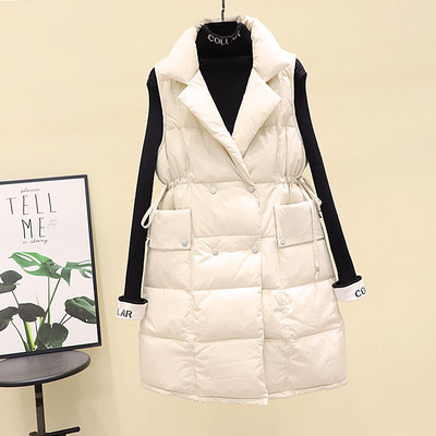 Moodne naiste vest taskute ja vöökoha lipsudega