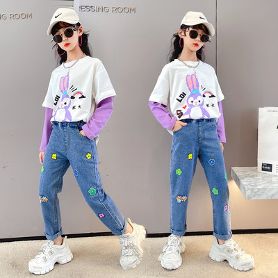 Laste sügiskomplekt kaheosalisest tikandiga pluusist ja teksadest