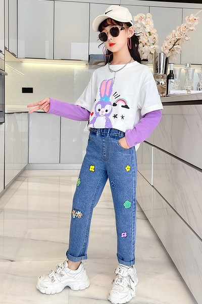 Laste sügiskomplekt kaheosalisest tikandiga pluusist ja teksadest