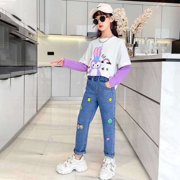 Laste sügiskomplekt kaheosalisest tikandiga pluusist ja teksadest