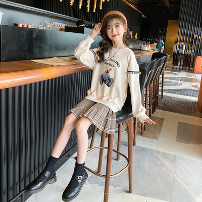 Moodne laste komplekt aplikatsiooniga ruudulisest seelikust ja pluusist