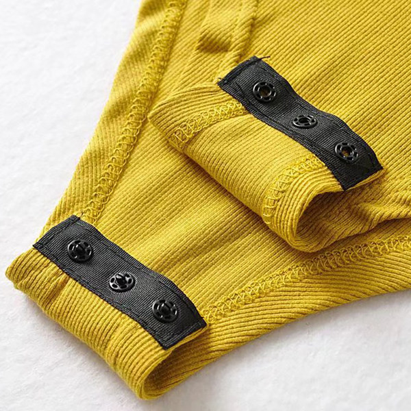 Μονόχρωμο γυναικείο κορμάκι με μακριά μανίκια και στρογγυλή λαιμόκοψη