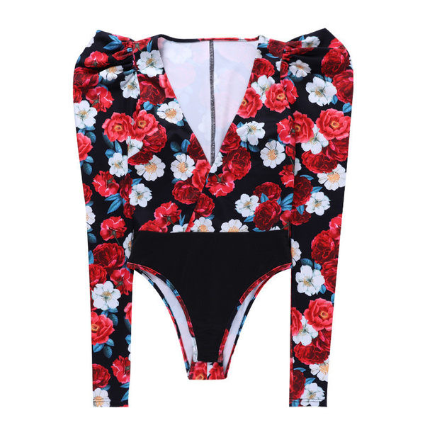 Stiilne lillelise mustri ja spitsikaelusega naiste keha