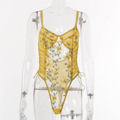 Női test hímzéssel és nyakkendővel