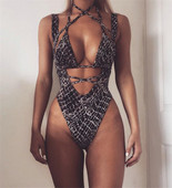 Naiste väljalõigatud ristrihmadega body