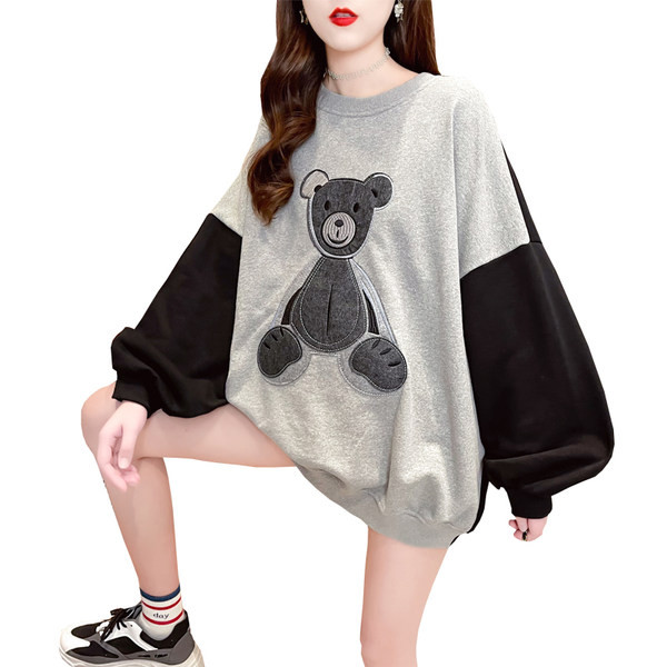 Széles női blúz mackóval