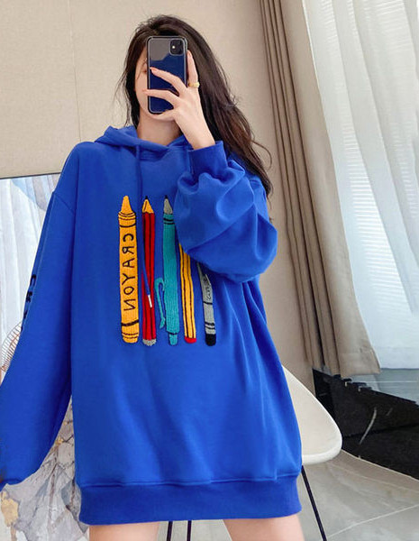 Női napi pulóver kapucnival és rátéttel