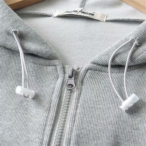 Lühikese mudeliga naiste dressipluus luku ja kapuutsiga