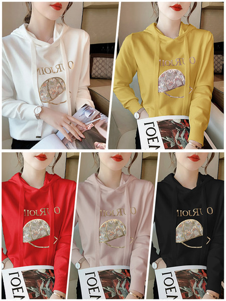 Kapuutsiga ja tikandiga naiste dressipluus