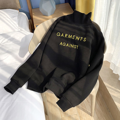 Új modell női blúz magas pólógallérral és felirattal