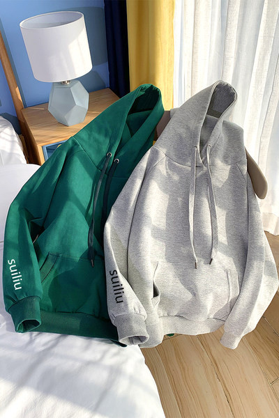 Naiste vabaaja kapuutsi ja taskutega dressipluus