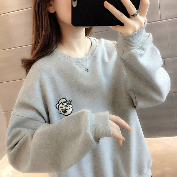 Vabaaja naiste pluus ovaalse dekoltee ja tikandiga