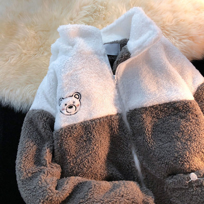 Női pehely pulóver hímzéssel