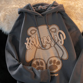 Női pulóverek hímzés és nyakkendő kapucnival