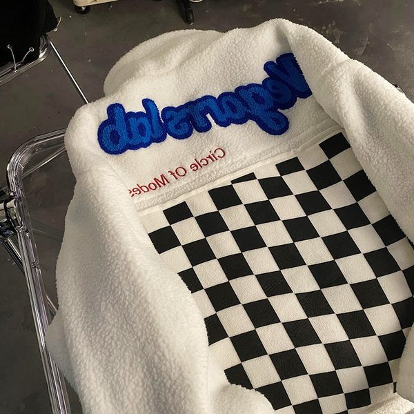 Naiste dressipluus kõrge kraega ja tikitud tekstiga