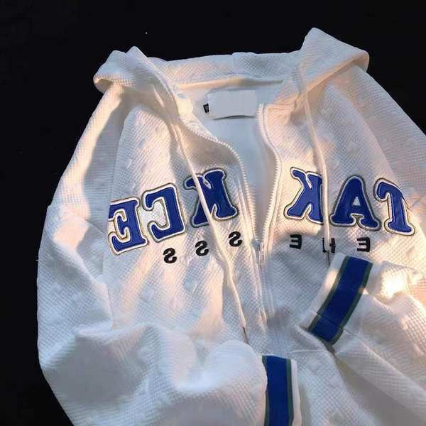 Kevadine naiste dressipluus kirja ja kapuutsiga