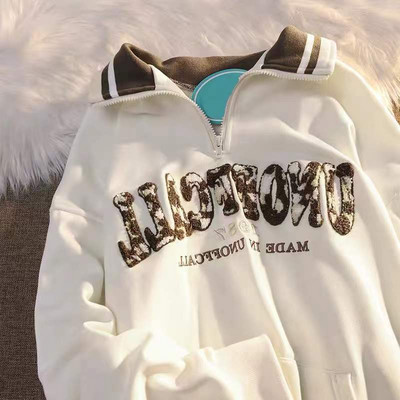 Tõmbluku ja tikandiga naiste dressipluus ilma kinnituseta