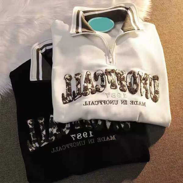 Tõmbluku ja tikandiga naiste dressipluus ilma kinnituseta