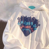 Modern női pulóver mintával és kapucnival