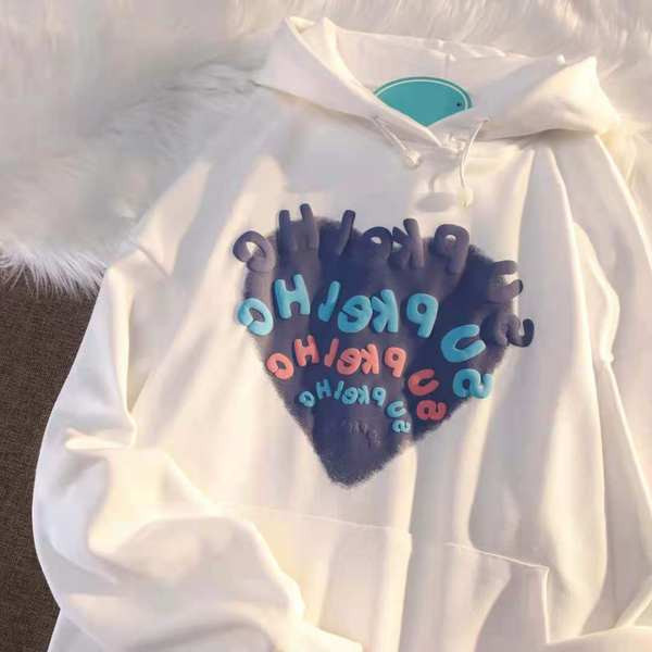 Modern női pulóver mintával és kapucnival