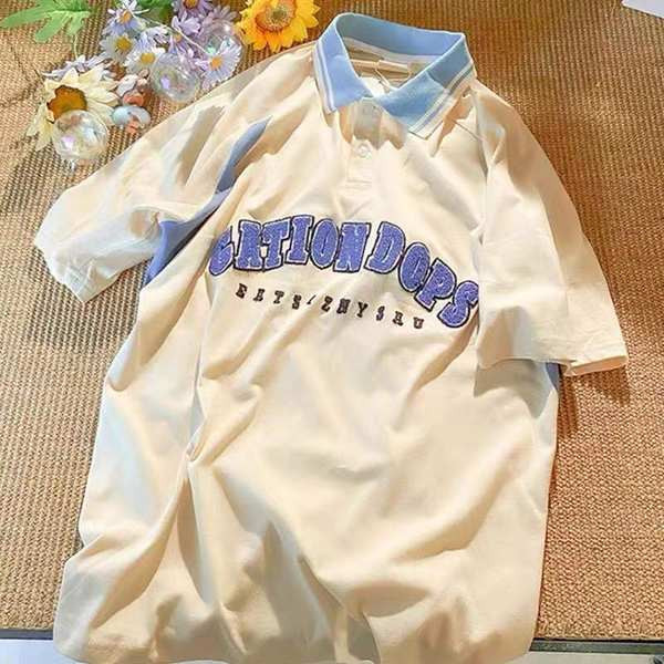 Naiste dressipluus klassikalise kraega ja tikitud tekstiga