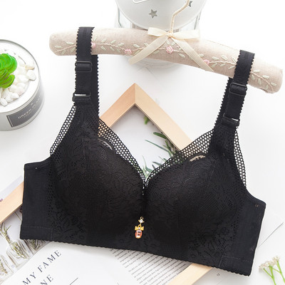 Moodne naiste rinnahoidja pitsi ja metallelemendiga