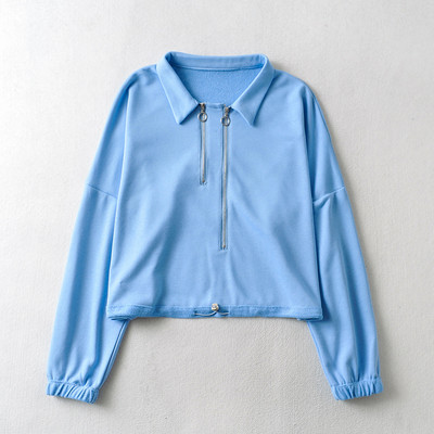 Ühevärviline tõmbluku ja pikkade varrukatega naiste dressipluus