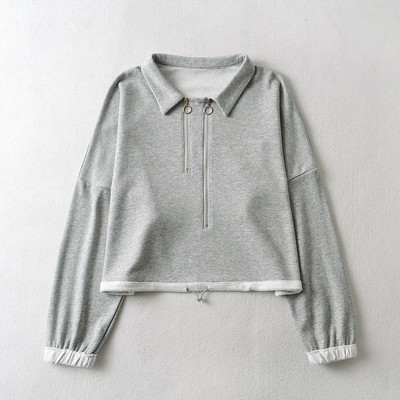 Ühevärviline tõmbluku ja pikkade varrukatega naiste dressipluus