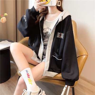 Naiste lai tasku ja tõmblukuga dressipluus