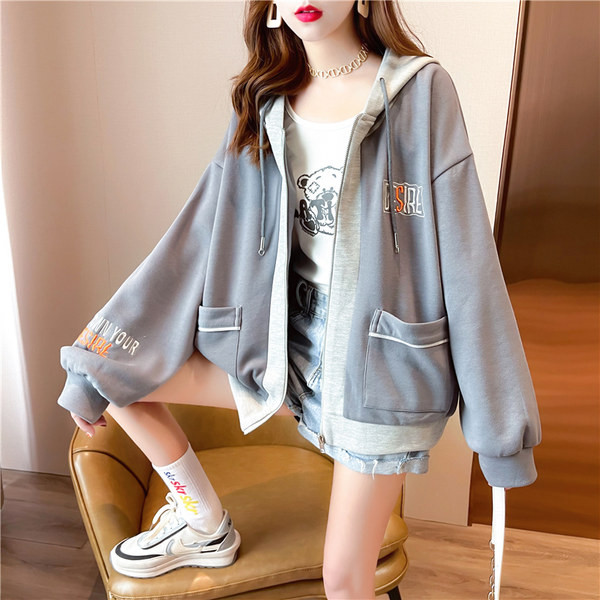 Naiste lai tasku ja tõmblukuga dressipluus