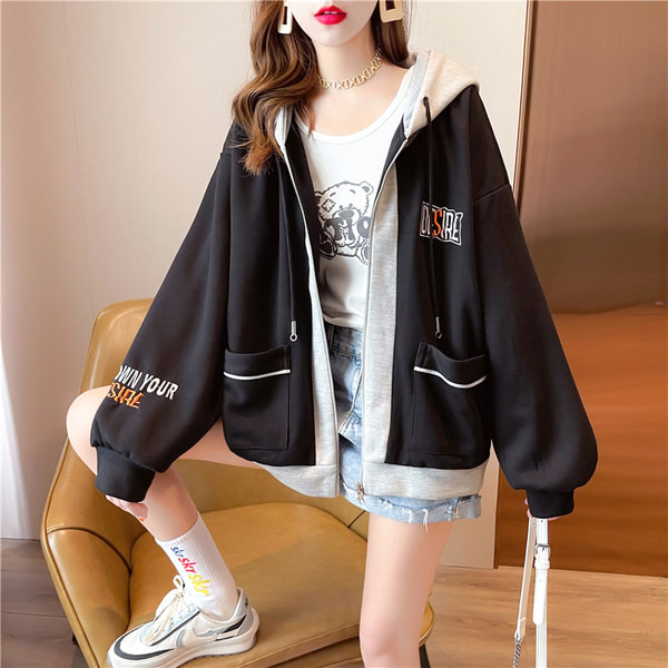 Naiste lai tasku ja tõmblukuga dressipluus